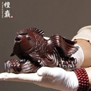 木雕金龍魚擺件的寓意和象征，木雕金龍魚擺件如何正確擺放木雕金龍魚擺件的寓意和象征意義