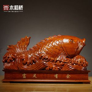 木雕金龍魚擺件應該怎么擺放，木雕金龍魚擺件招財效果研究金龍魚擺件與家居布局協調