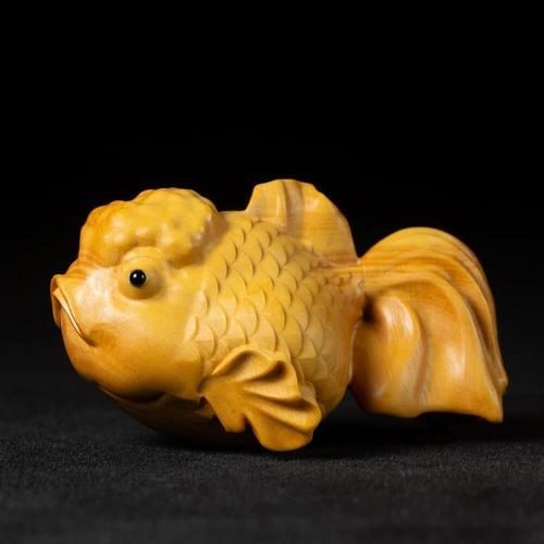 木雕金魚圖片大全大圖：“木雕金魚”傳統(tǒng)手工藝品的藝術魅力與視覺呈現(xiàn)