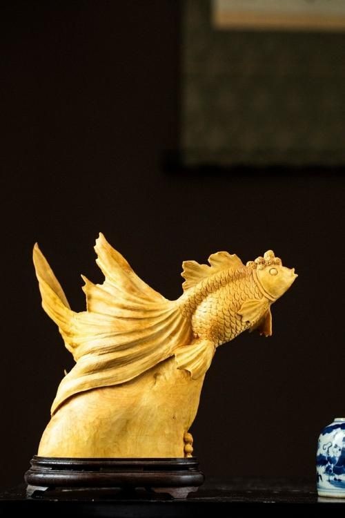 木雕金魚圖片大全大圖：“木雕金魚”傳統(tǒng)手工藝品的藝術魅力與視覺呈現(xiàn)