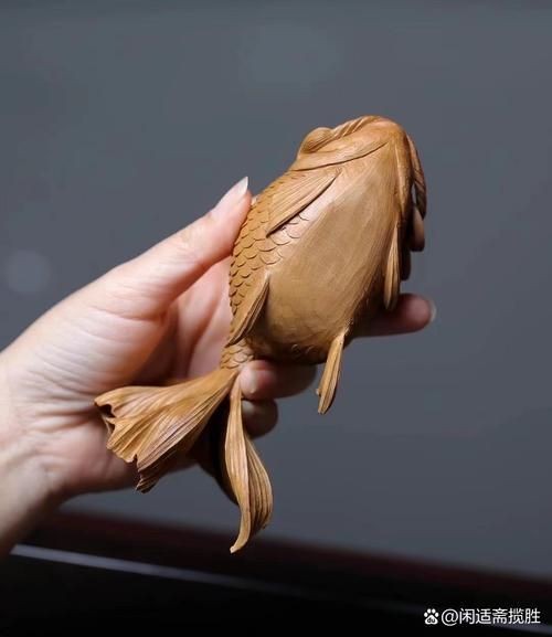 木雕金魚圖片大全大圖：“木雕金魚”傳統(tǒng)手工藝品的藝術魅力與視覺呈現(xiàn)