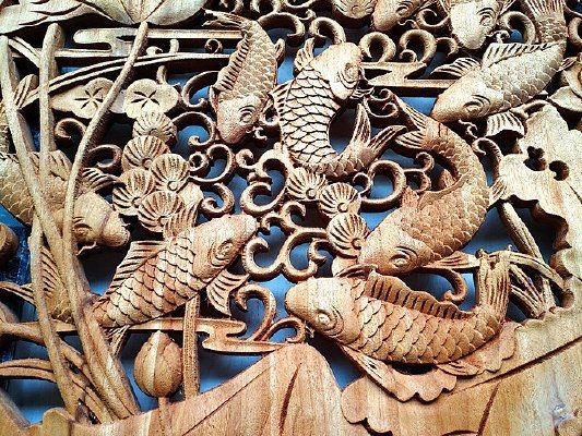 木雕金魚圖片大全大圖：“木雕金魚”傳統(tǒng)手工藝品的藝術魅力與視覺呈現(xiàn)