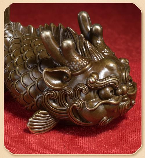 給我一些龍頭魚尾擺件的圖片【龍頭魚尾擺件寓意與現代文化寓意與現代設計風格推薦】