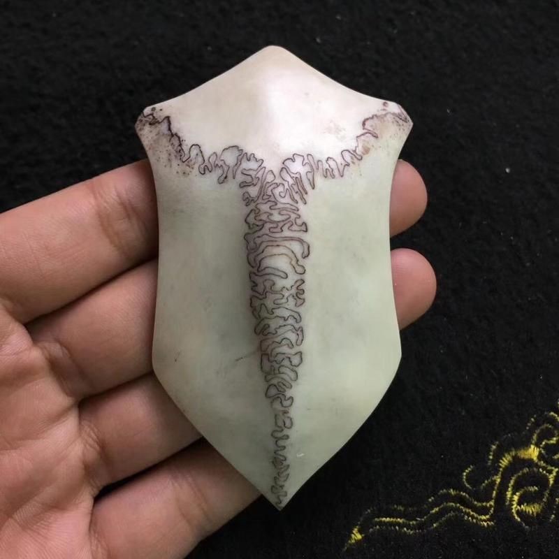 虎三界真品最明顯特征