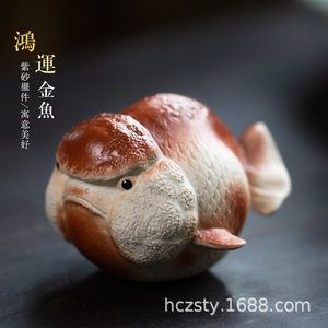 金龍魚擺件寓意什么意思和象征：金龍魚擺件的寓意