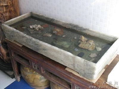 古代石魚缸是一種怎樣的存在？：關于古代石魚缸的一些詳細信息