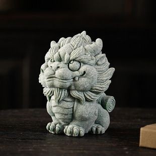 麒麟能擺在魚(yú)缸上嗎：麒麟擺放在魚(yú)缸上具有積極意義的意義但直接擺放在魚(yú)缸上
