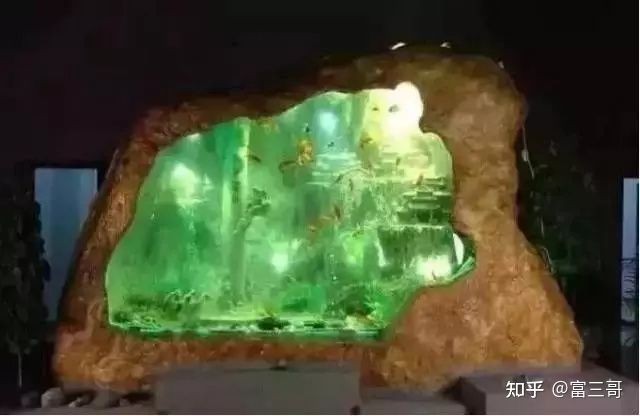 翡翠原石放魚缸里有什么作用？：翡翠原石放入魚缸里有什么作用？