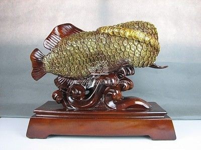 金龍魚擺件的風(fēng)水作用與功效：辦公室擺放金龍魚擺件好不好