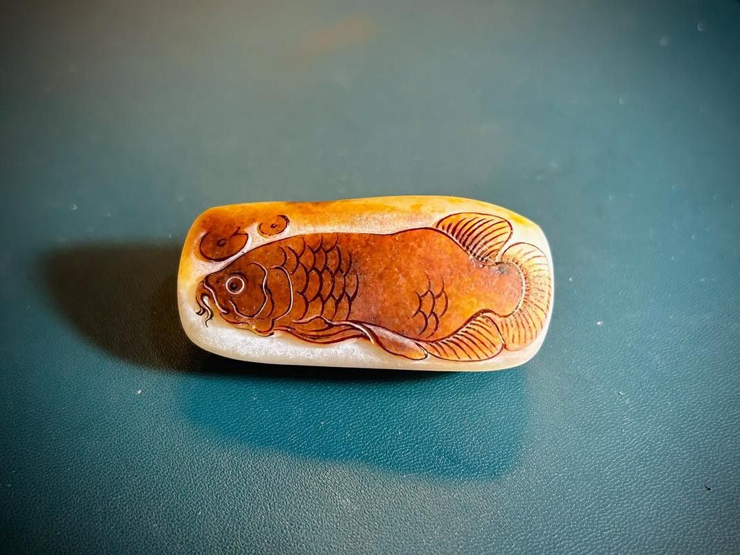 如何辨別金龍魚玉雕的真偽？