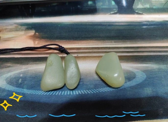 如何辨別真假和田玉龍魚擺件？