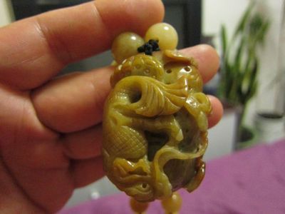 雕刻龍魚的寓意（玉雕龍魚的寓意和象征是什么）