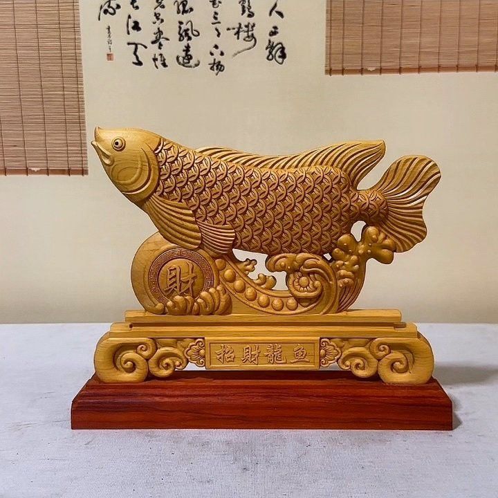 如何鑒別金龍魚木雕的真偽