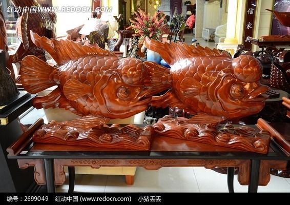 木雕金龍魚尺寸圖：木雕金龍魚手把件價格檀木金龍魚手把件價值評估