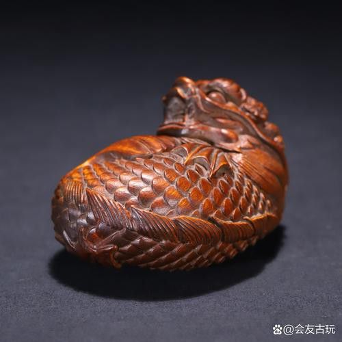 推薦一些現(xiàn)代龍魚木雕作品