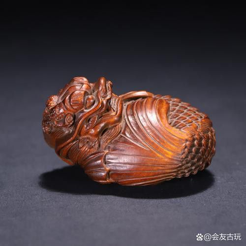 推薦一些現(xiàn)代龍魚木雕作品
