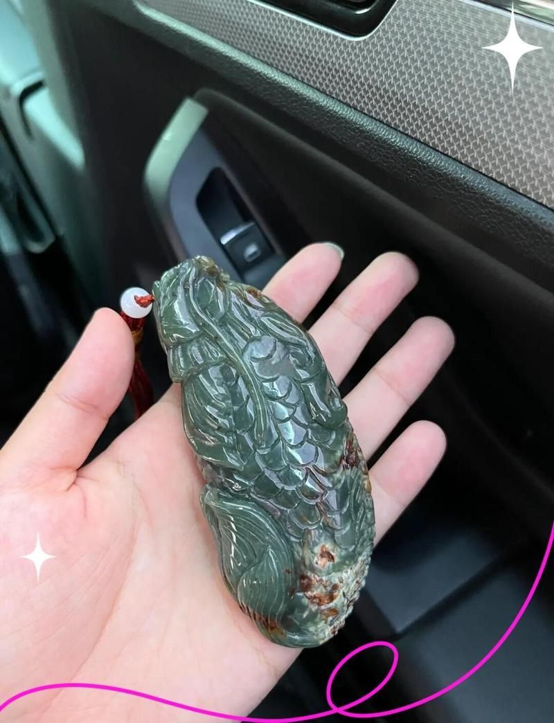 龍魚手把件的寓意和象征