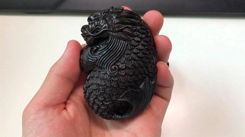 龍魚手把件的寓意和象征
