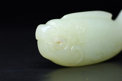 和田玉雕刻龍魚的寓意是什么：和田玉雕刻龍魚是一件富含寓意的藝術品