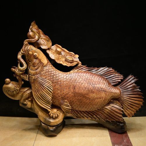 金龍魚(yú)木雕擺件如何保養(yǎng)？