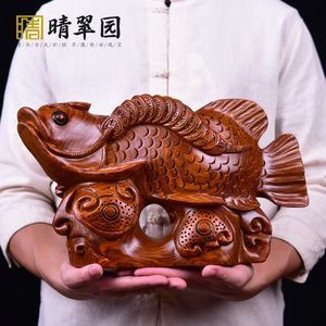 雕刻金龍魚的寓意和象征意義：金龍魚的寓意和寓意