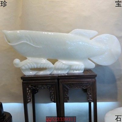 玉石金龍魚擺件寓意：玉石金龍魚擺件在中國傳統文化中具有豐富的寓意