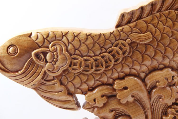 龍魚木雕壞了扔了怎么辦：對于損壞的龍魚木雕，有以下幾種處理方式，可以修復