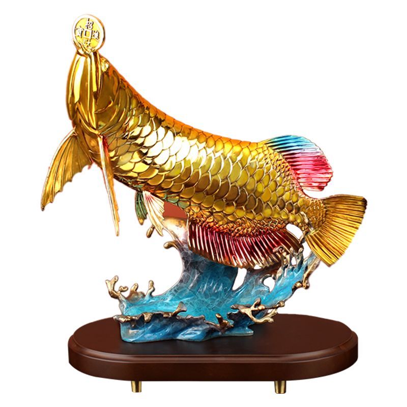金龍魚擺件的風水寓意：金龍魚擺件寓意著財富、吉祥和富足，寓意著吉祥和富足