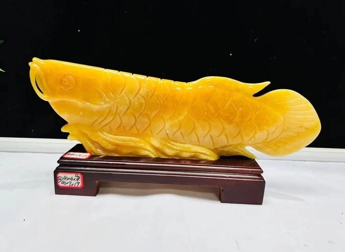 哪里可以找到更多玉石金龍魚圖片：和田玉金龍魚精工雕刻作品及家居擺放效果圖