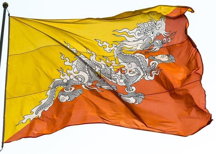 能提供一張不丹國旗的圖片嗎？：不丹國旗的設計與設計