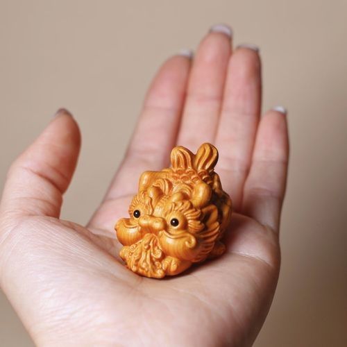 哪里可以找到更多木雕龍魚圖片