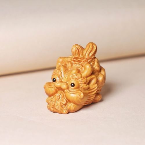 哪里可以找到更多木雕龍魚圖片