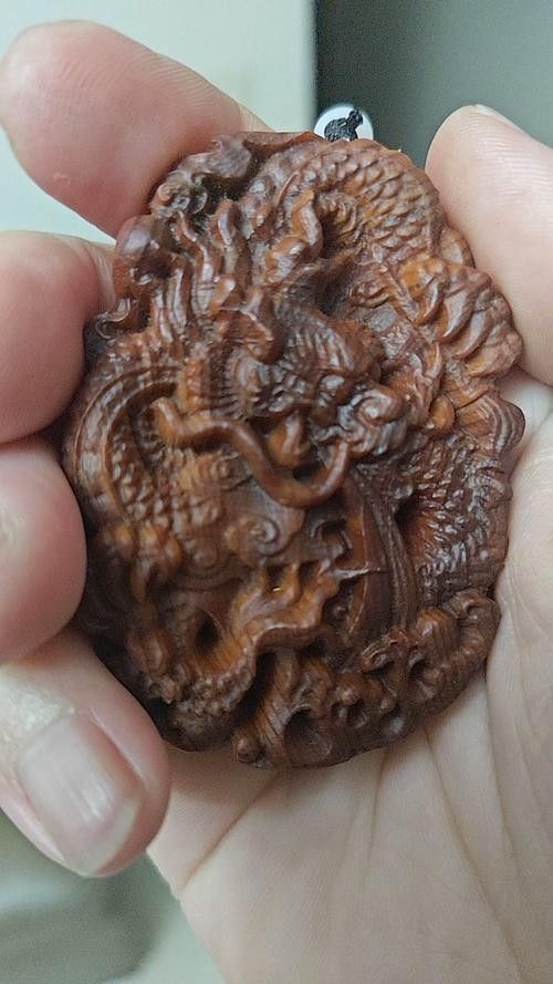 哪里可以找到更多木雕龍魚圖片