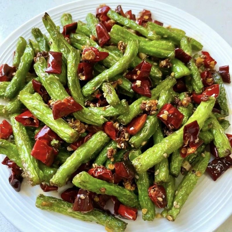 干煸菜肴炸后如何瀝油（干煸四季豆瀝油的正確做法，比飯店的還好吃大成子尋味）