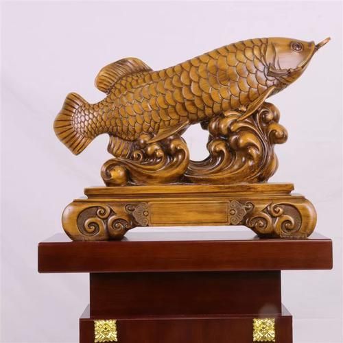 聚財龍魚擺件圖片（聚財龍魚擺件如何選擇聚財龍魚擺件）