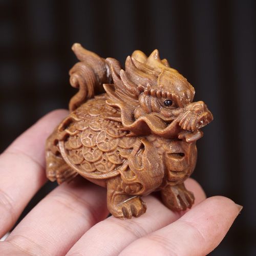 給我一些關(guān)于龍龜擺件的圖片，如何選擇適合的龍龜擺件，龍龜擺件的價(jià)格范圍是多少