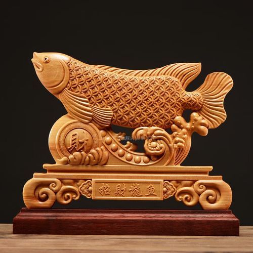 木雕金龍魚的市場(chǎng)價(jià)格是多少，木雕金龍魚市場(chǎng)價(jià)格