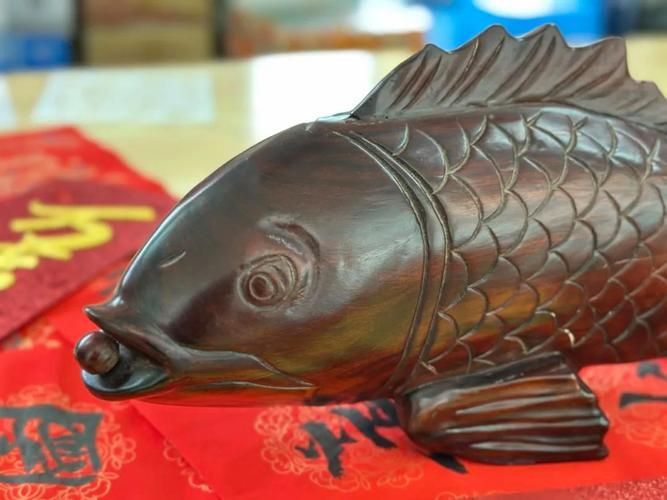 如何挑選一件好的木雕魚，如何挑選一件好的木雕魚，有哪些著名的木雕魚流派