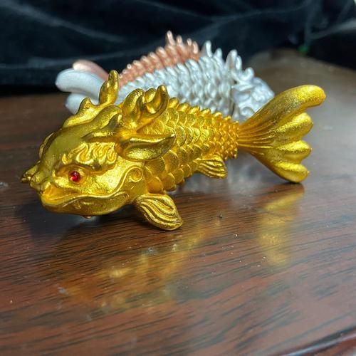 有沒有龍頭魚擺件的圖片示例，龍頭魚擺件有哪些材質選擇