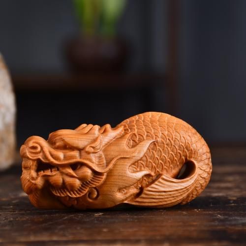 給我一些龍頭魚身擺件的圖片，龍頭魚身擺件怎么選