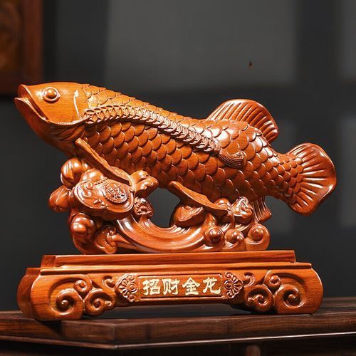 金龍魚木雕的價格范圍是多少，金龍魚木雕價格和適用場景對比材質和適用場景