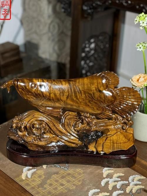 有哪些著名的金龍魚木雕作品，地堅硬且自帶幽香的金龍魚木雕作品：金龍魚木雕作品