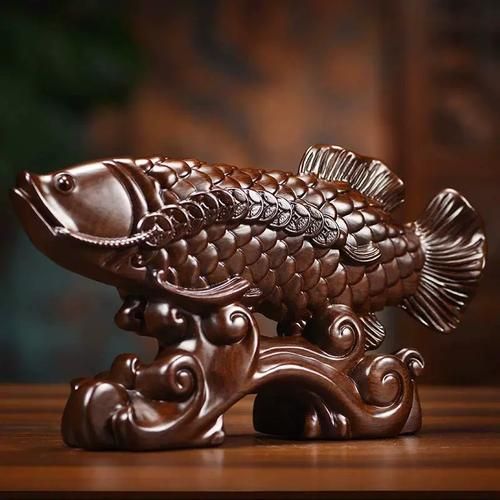 如何辨別真假雕刻金龍魚，如何辨別真假金龍魚