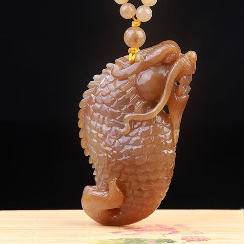給我一些鑒別和田玉龍魚觀音的真偽的實例，和田玉龍魚觀音的真偽鑒別