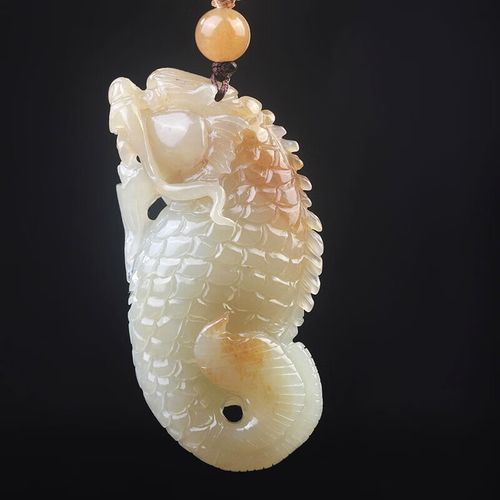 給我一些鑒別和田玉龍魚觀音的真偽的實例，和田玉龍魚觀音的真偽鑒別