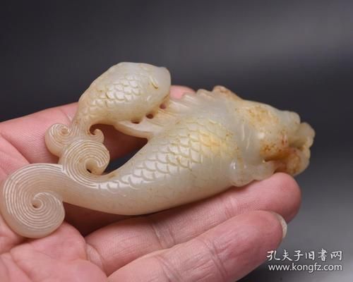 給我一些龍頭魚玉擺件的圖片，——龍頭魚玉擺件的真偽