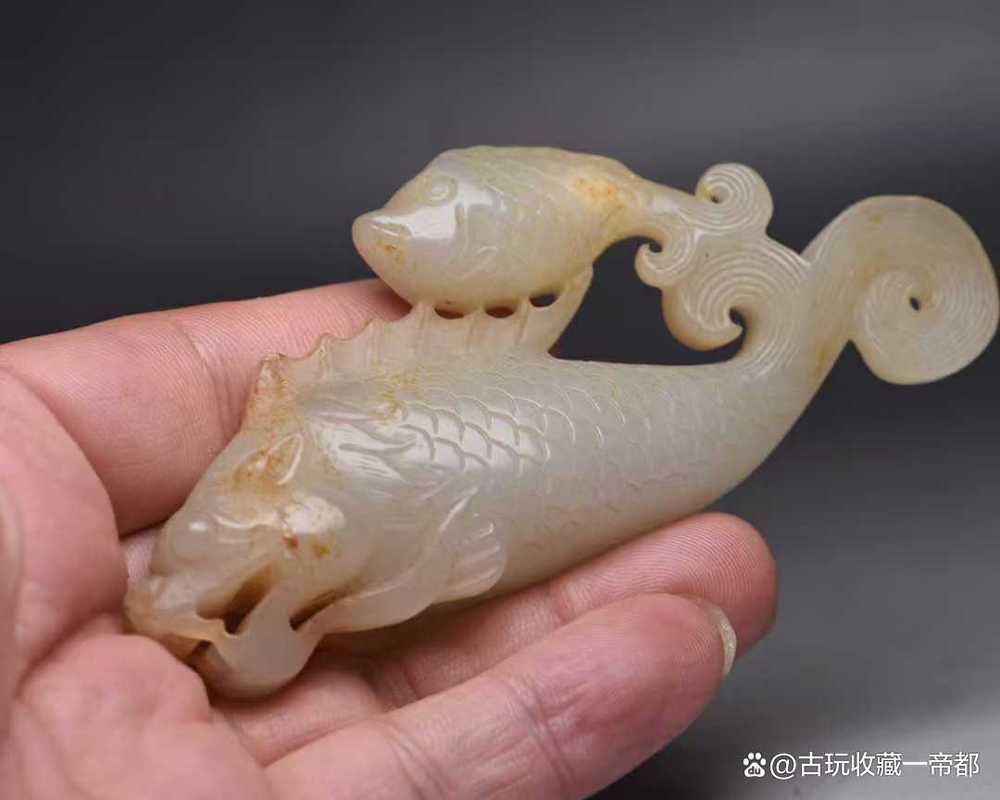 給我一些龍頭魚玉擺件的圖片，——龍頭魚玉擺件的真偽
