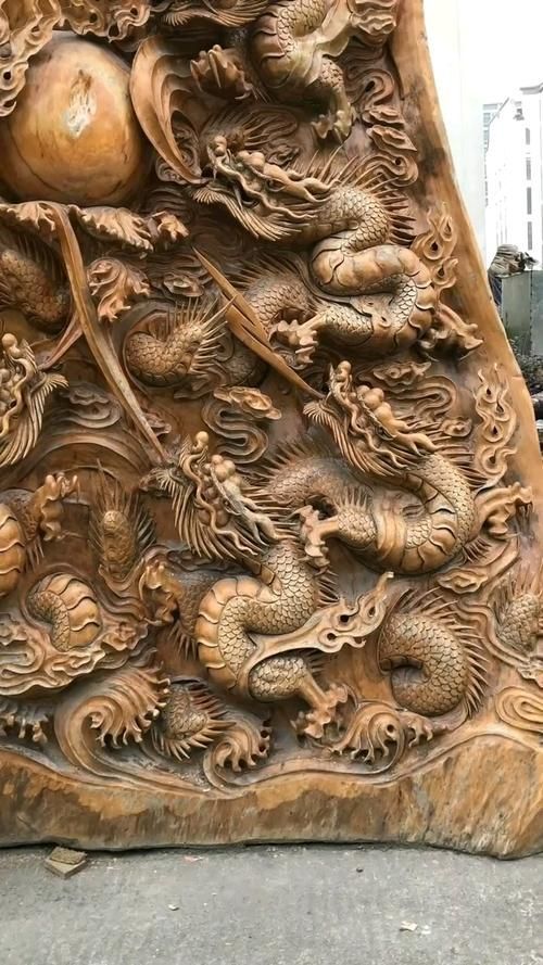 龍魚木雕有哪些名家作品，龍魚木雕名家龍魚木雕作品:龍魚木雕作品欣賞