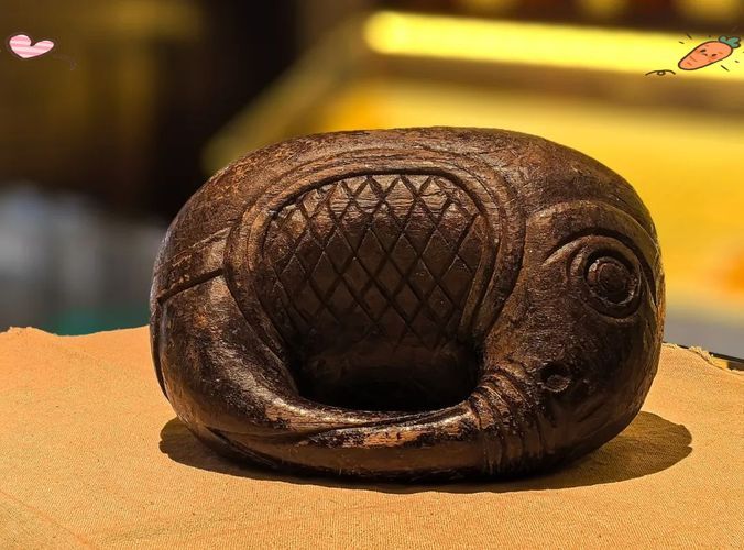 如何判斷木雕金魚的年代和真?zhèn)危镜窠痿~年代判斷與真?zhèn)舞b定