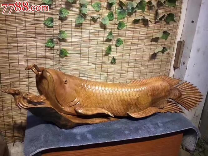 給我推薦一些高清的金龍魚木雕圖片，高清的金龍魚木雕圖片